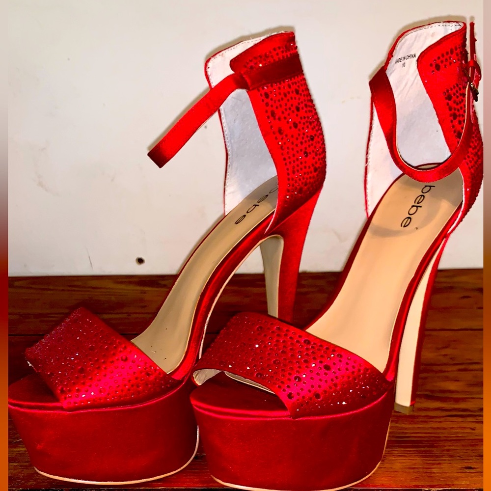 Red studded BEBE heels